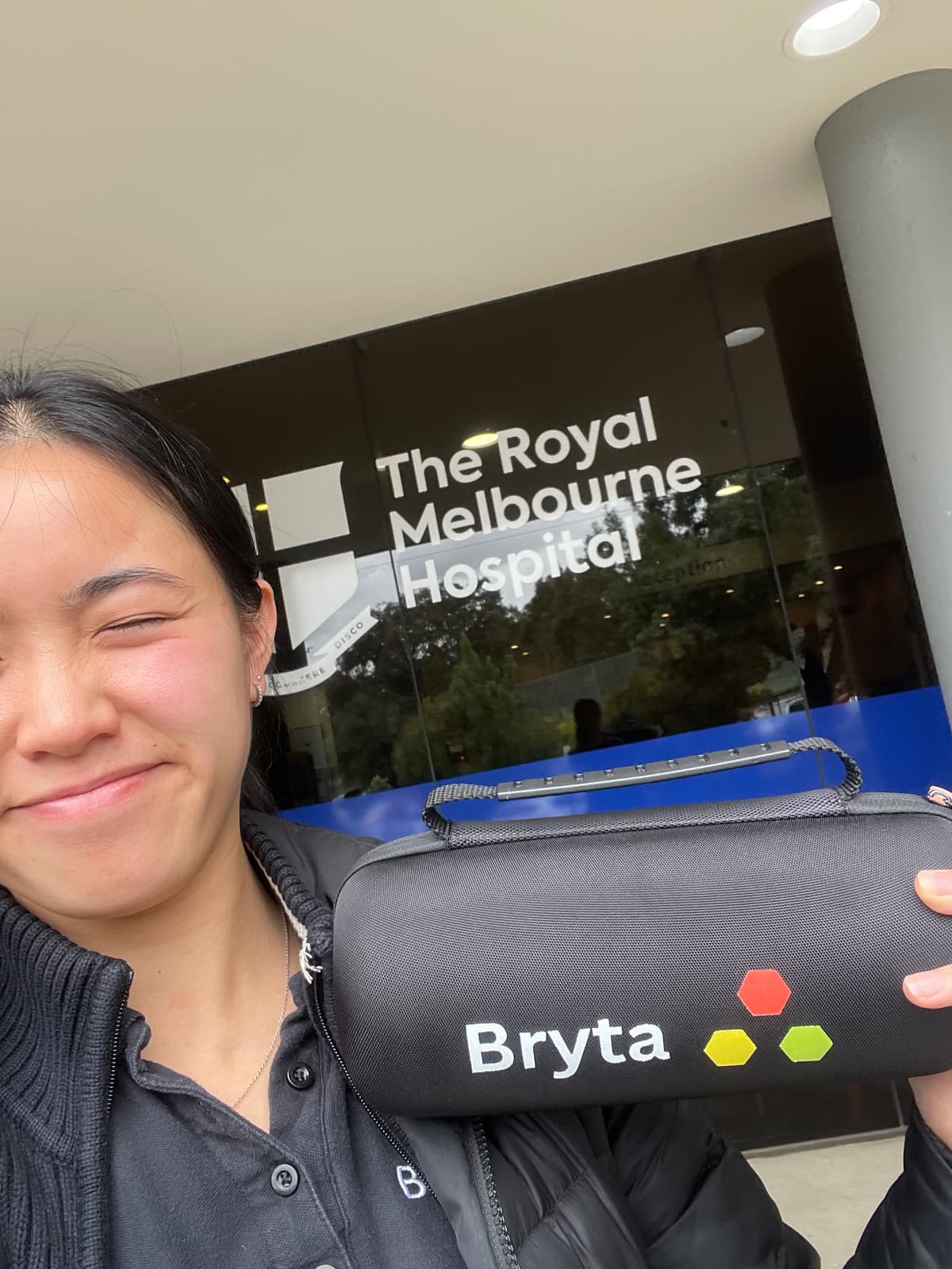 Bryta team member with the Bryta device outside Royal Melbourne Hospital